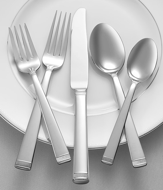 white plate with silver fork, knife and spoons 