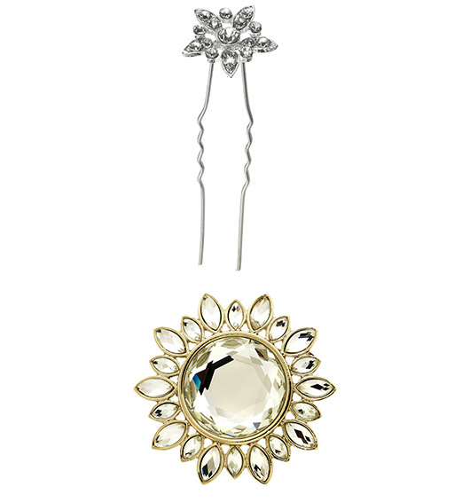 Flower silver hair grip and gold flower brooch.